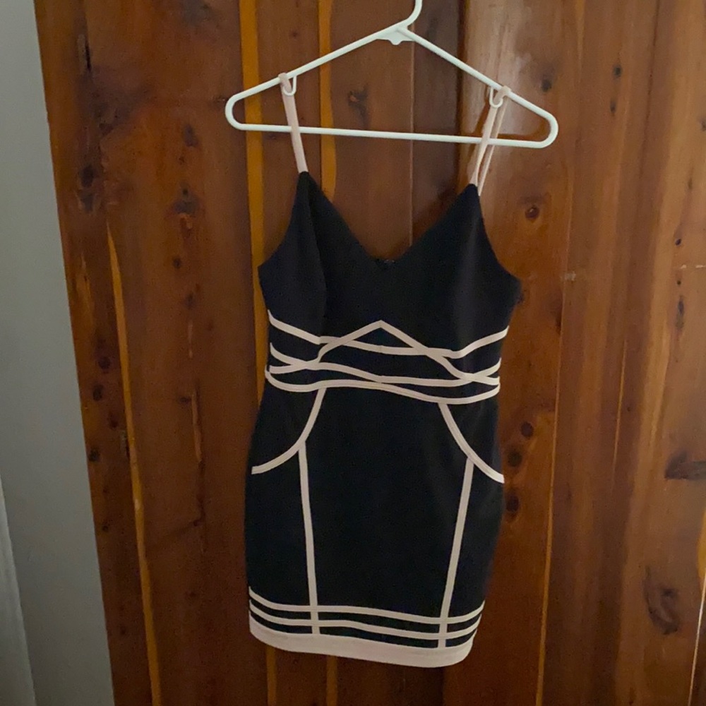 Boutique bought black body con dress with pink detail